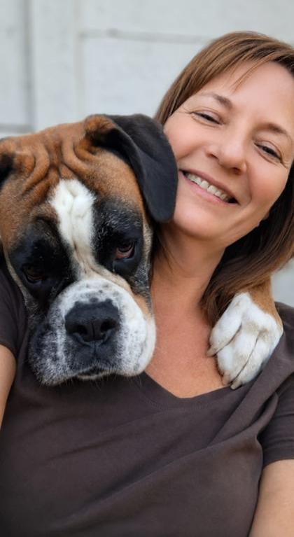 Sanet Moore, Head Trainer at Dogz360, with her dog Ziggy